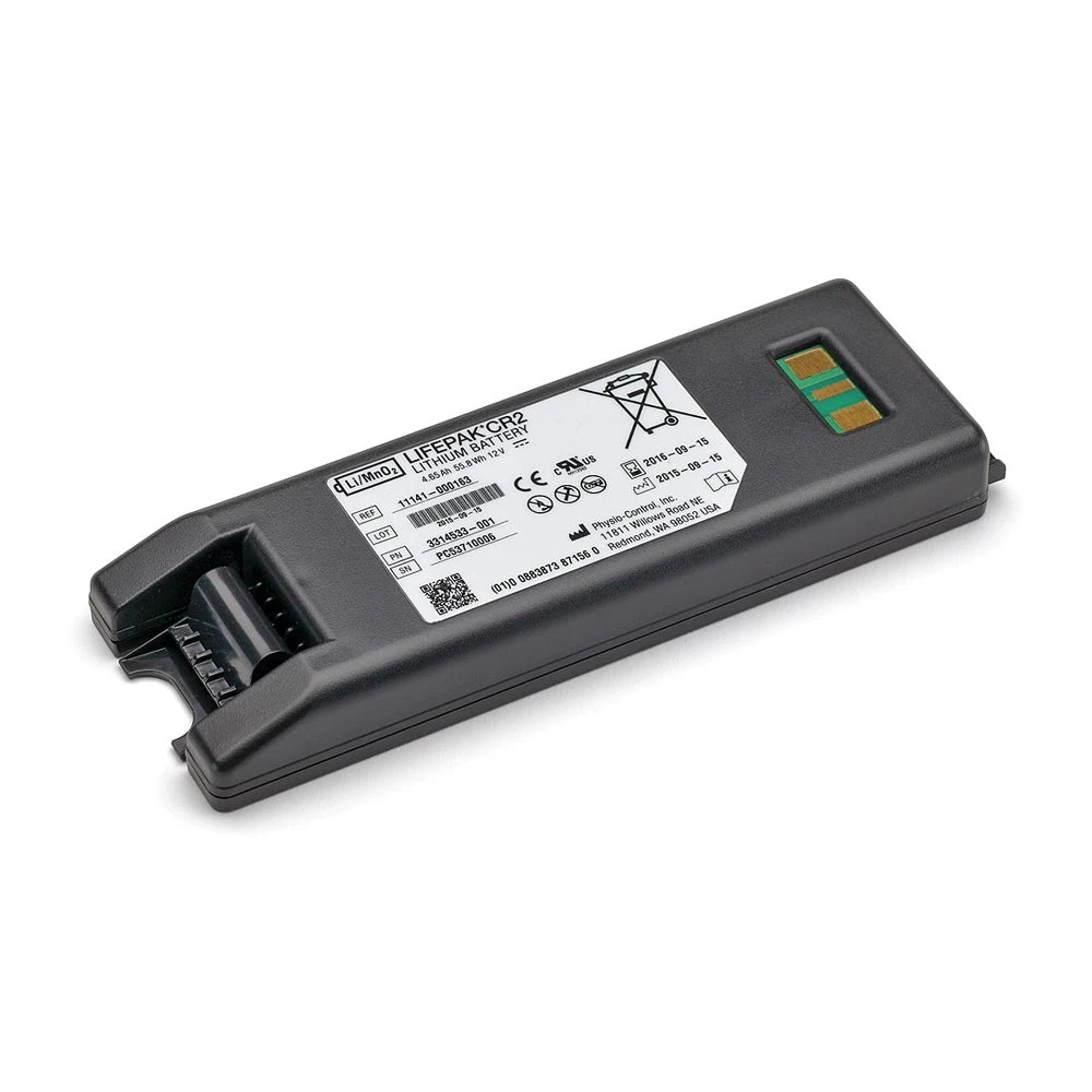 Batterie noire rectangulaire pour défibrillateur, avec une étiquette imprimée.